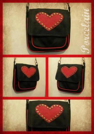 Art.1036 cartera con bolsillo externo color Negro y Rojo $210